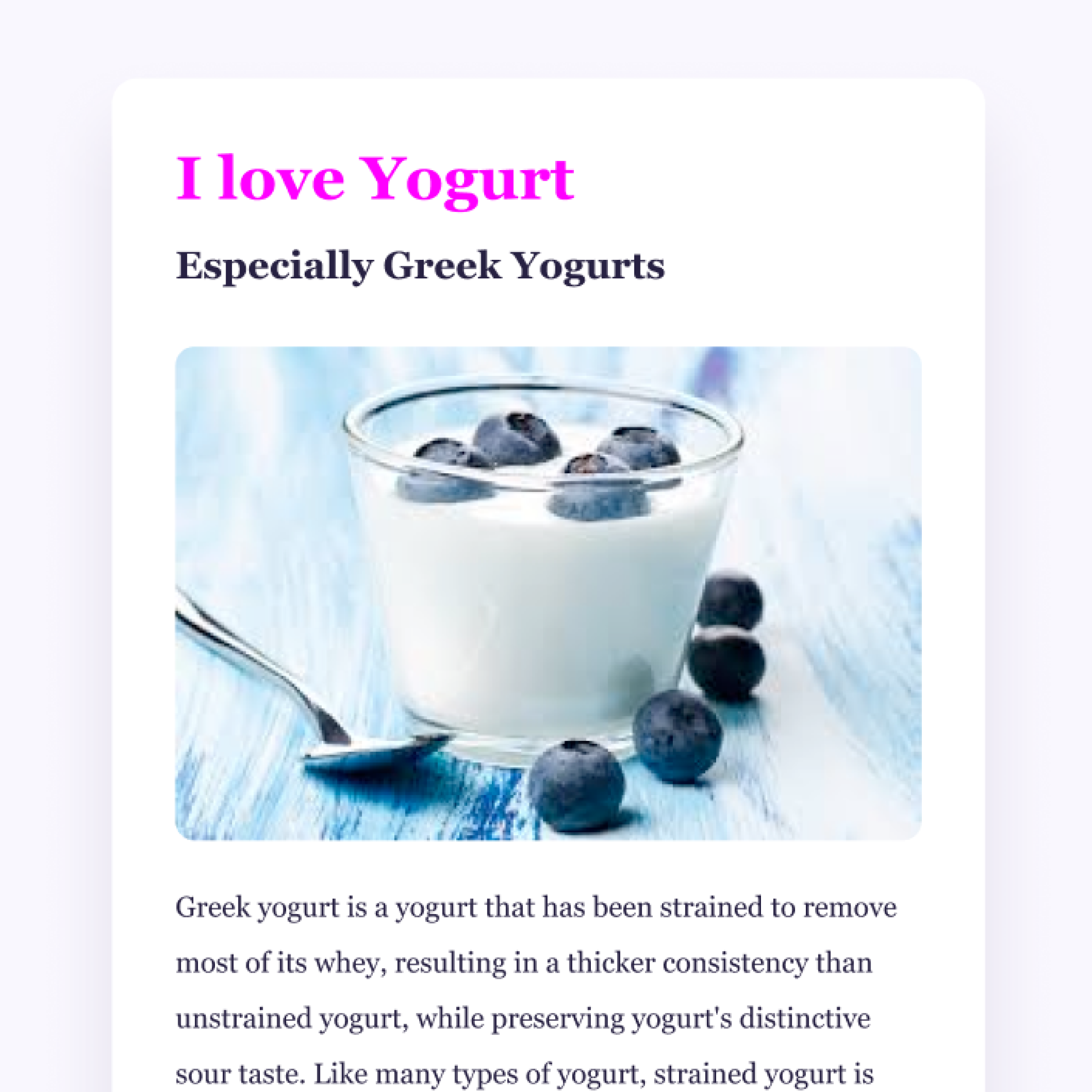 A glass dish of thick greek yogurt with blueberries